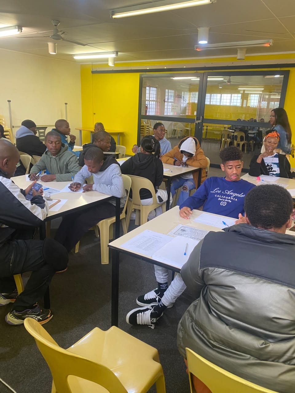 Participants working through their pathsetting worksheets — mapping strengths, options and next steps.